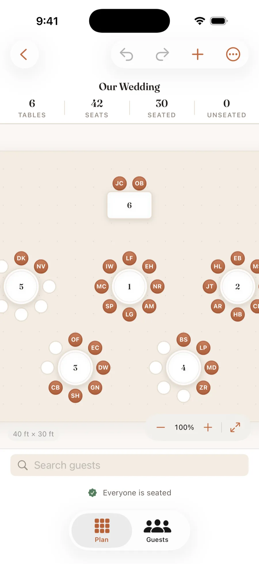 The Seatful seating planner on iPhone showing a wedding floor plan with six tables and a head table